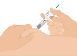 A close-up of a person's hands holding a syringe

Description automatically generated
