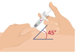 A close-up of a hand holding a syringe

Description automatically generated