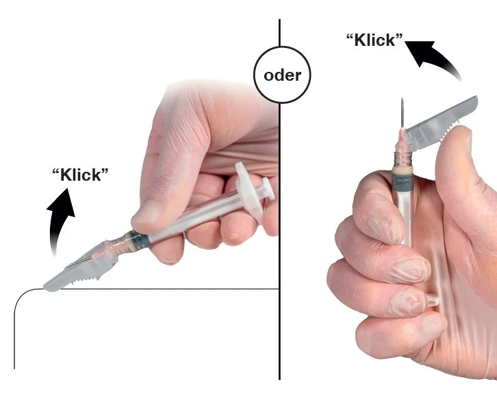 A hand holding a syringe

Description automatically generated